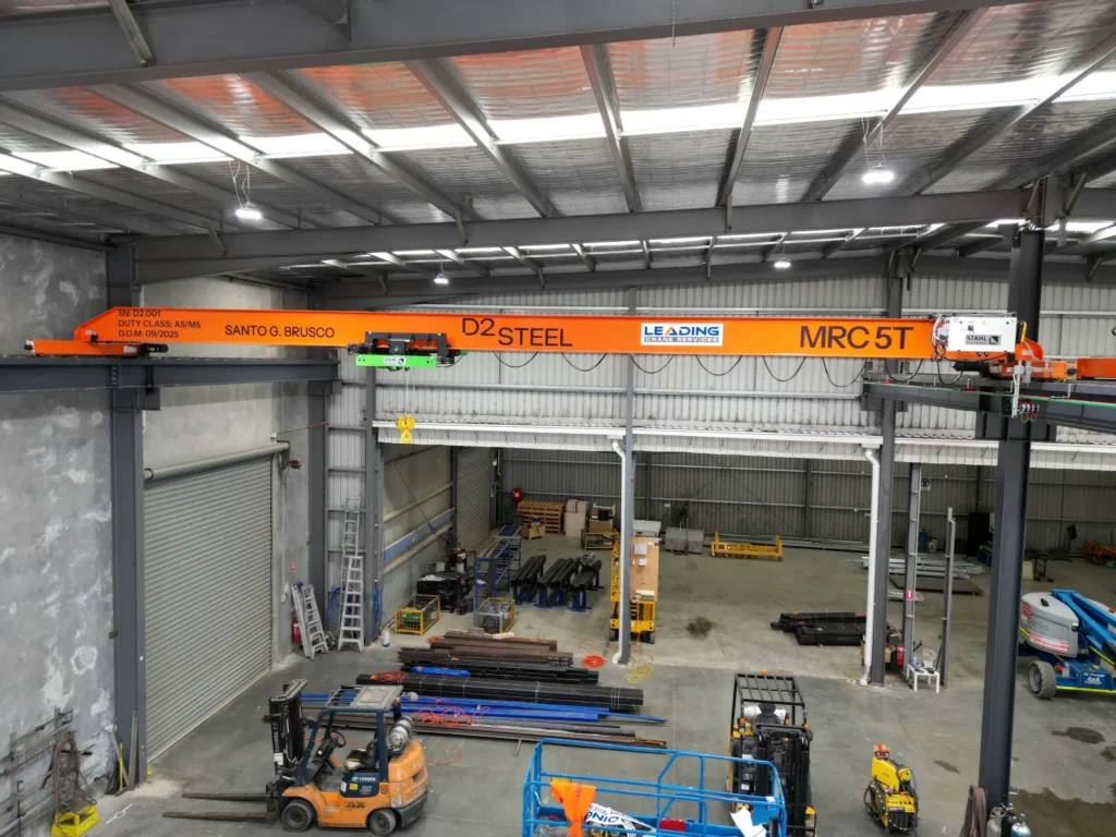 D2 Steel installation bridge crane MRC 5T operating in warehouse for heavy material handling and fabrication work
